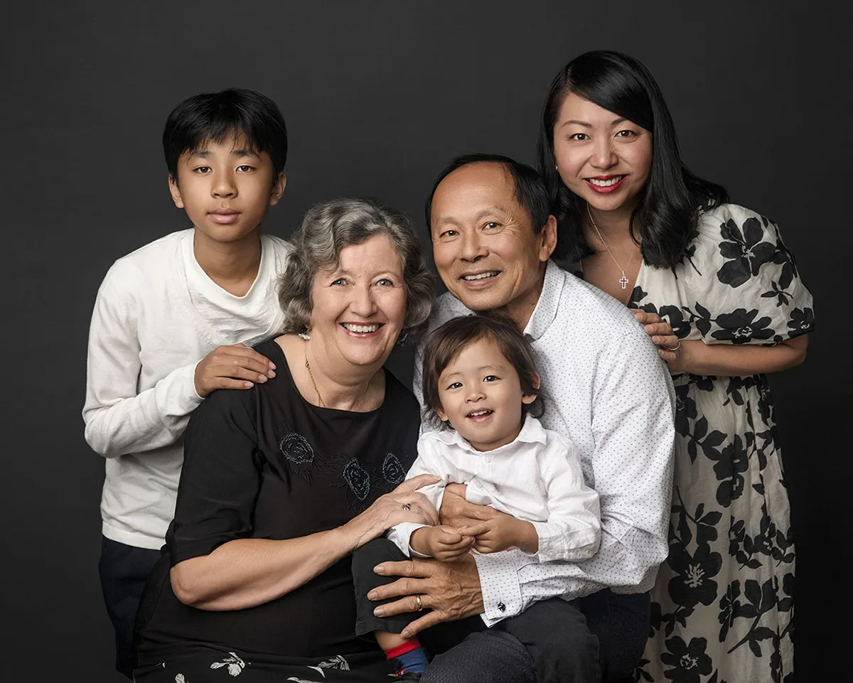 Warm connected family portrait photographed by Photo Hive in Auckland