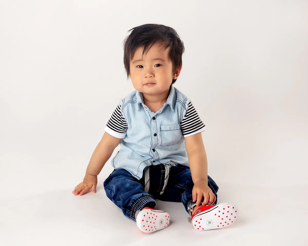 Baby milestone portrait photographed at Photo Hive studio in Auckland