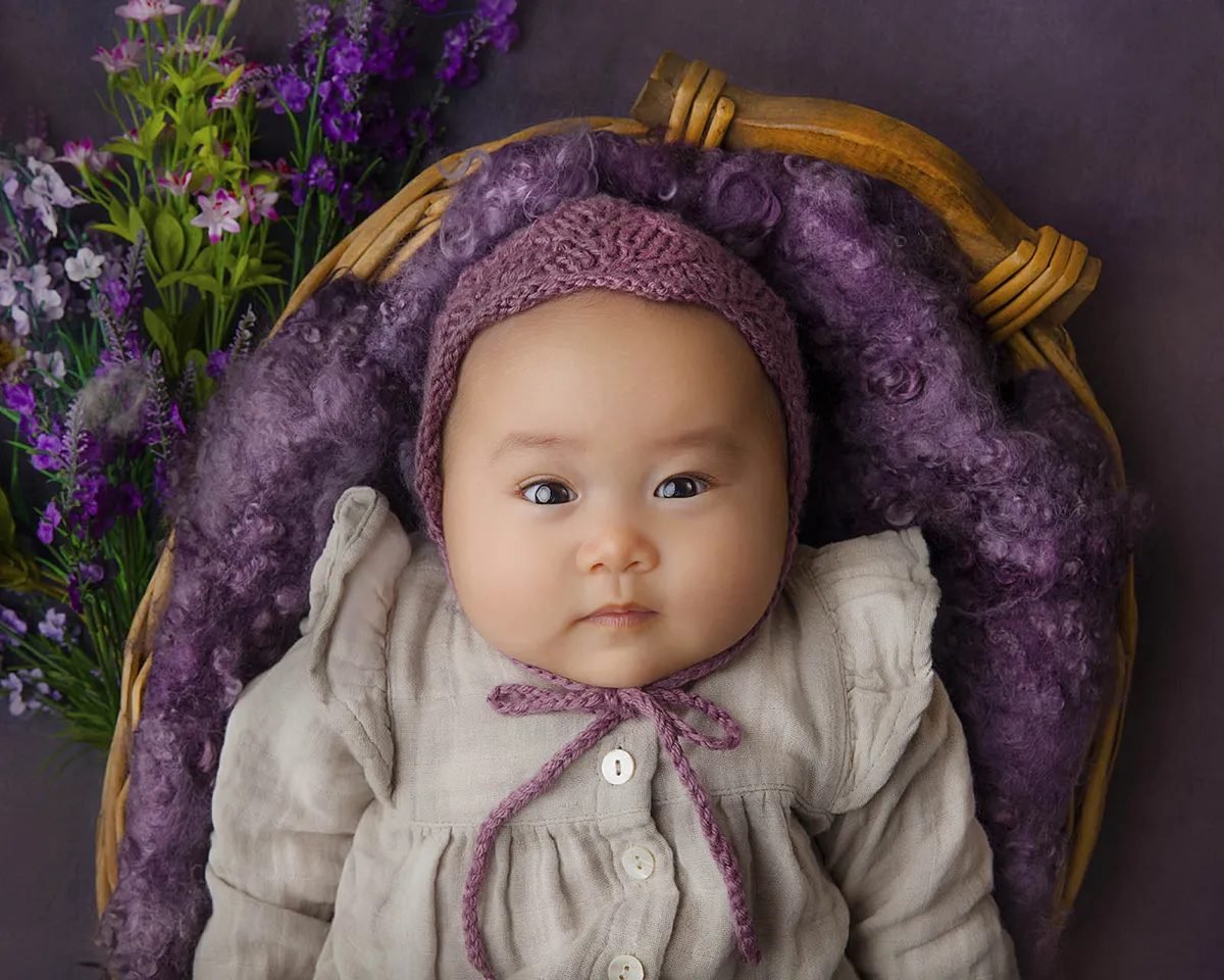Family and baby milestone portrait photographed by Photo Hive in Auckland