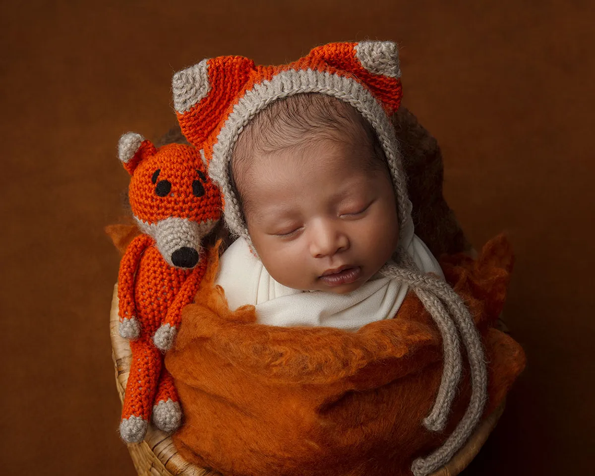 Sleeping newborn baby photographed at Photo Hive Auckland studio
